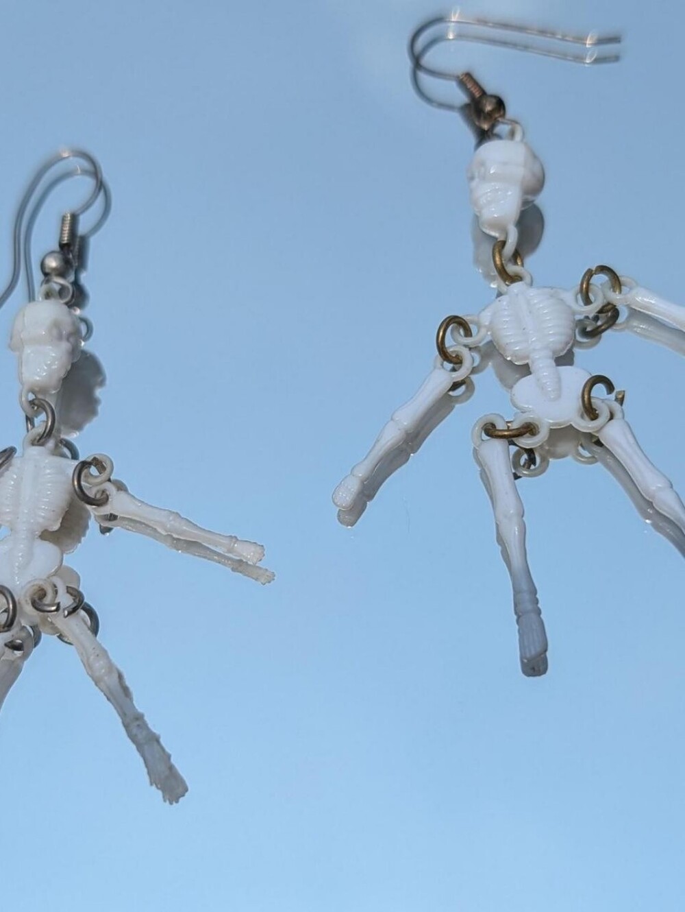 White & Brass Skeleton Dangle Earrings